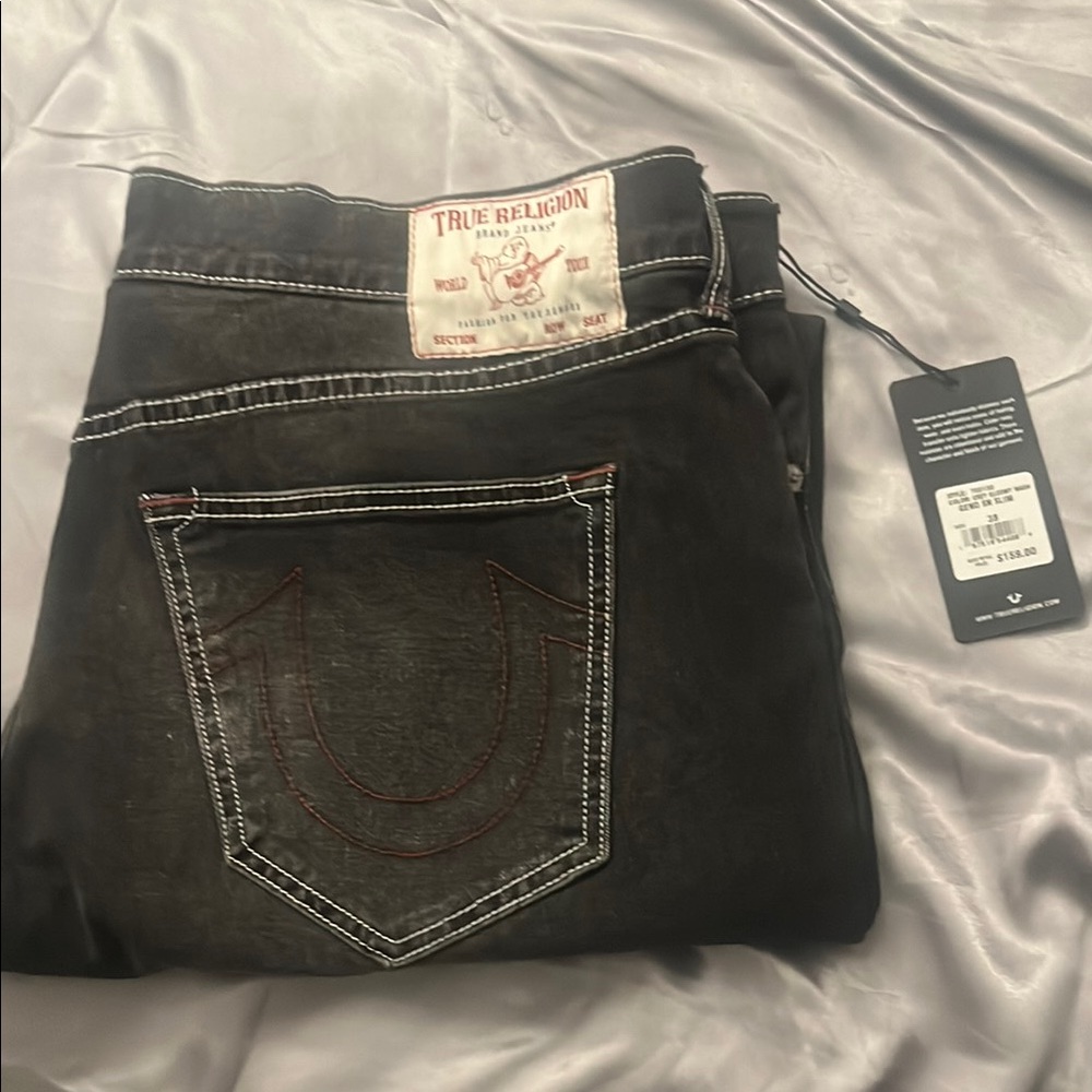 True Religion Black Jeans with Contrast Stitching on and Leather Patch